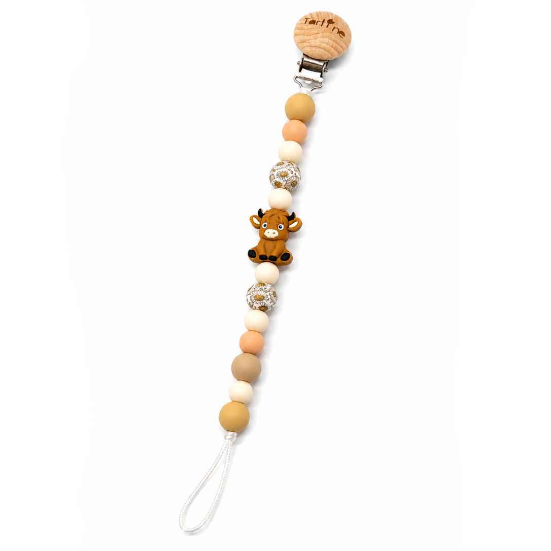 Attache à suce Vache Highland Fleurie Beige Boutique Tartine